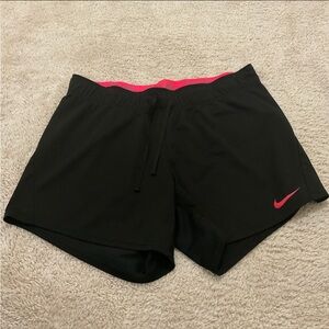 Nike pink band athletic running shorts